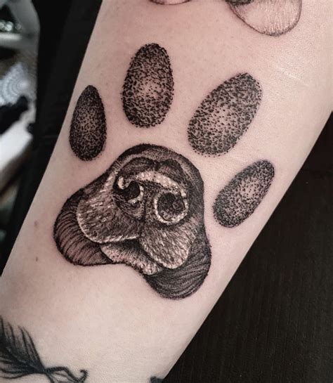 paw print tattoo